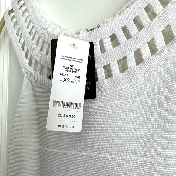 NWT Bebe White Bodycon Peplum Mini Dress Cutout Detail Sexy Cocktail Dress XS - Picture 11 of 11